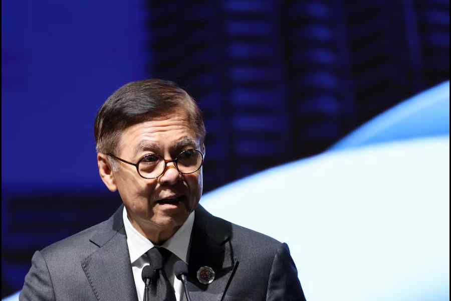 Displaced people gather inside a temporary shelter amid deadly clashes between Thailand and Cambodia along a disputed border area, in Buriram province, Thailand, December 9, 2025.