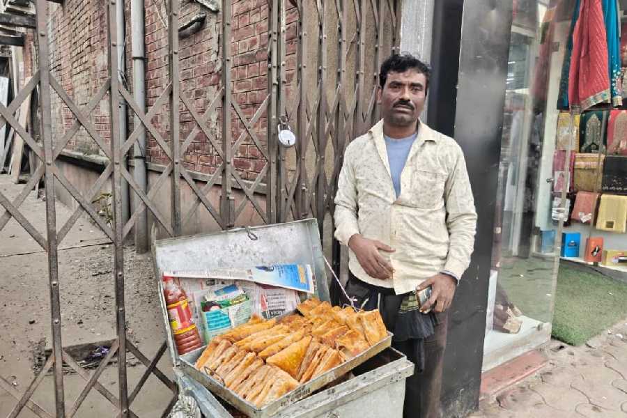 Sheikh Riyazul sells patties at Kidderpore on Tuesday. 