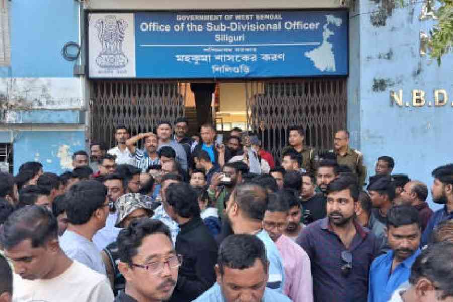 Stakeholders of the tourism and transport sectors demonstrate in front of the SDO office in Siliguri on Tuesday. Picture by Passang Yolmo
