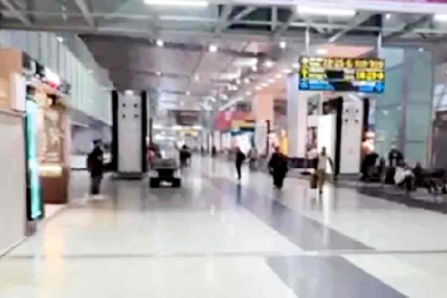 The near-empty departure area of the airport around 7am on Wednesday. 