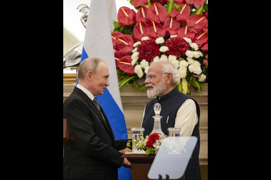 Prime Minister Narendra Modi with Russian President Vladimir Putin during a joint press statement after their meeting at the Hyderabad House, in New Delhi, Friday, Dec. 5, 2025.