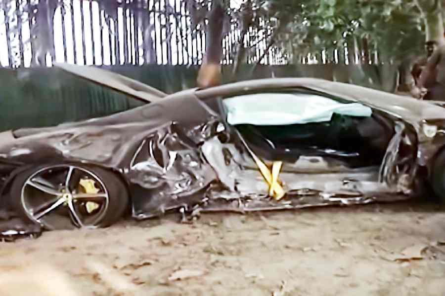 The mangled Blu Pozzi Ferrari 296GTB near the race course on Wednesday