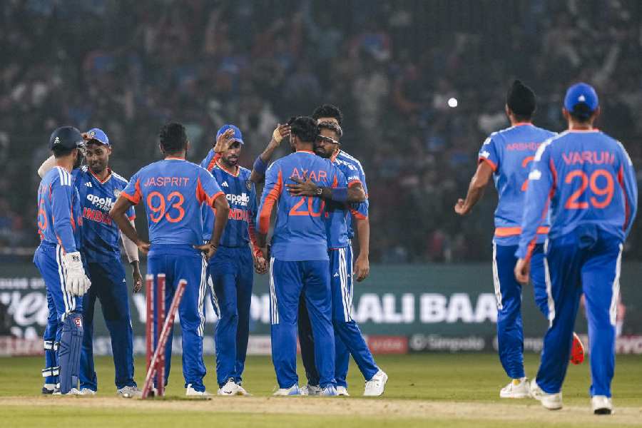 Suryakumar Yadav (second from left) and his men celebrate during India’s 101-run win over South Africa in thefirst T20I in Cuttack on Tuesday.