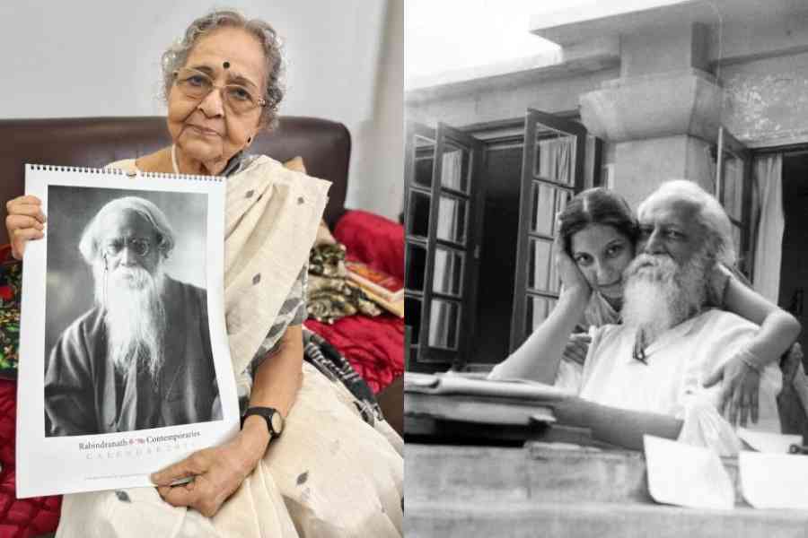Minakshi Sinha of JC Block shows the Tagore calendar she has helped with. Rabindranath Tagore with a young Ranu Adhikari, the later-day Lady Ranu Mukherjee in his study