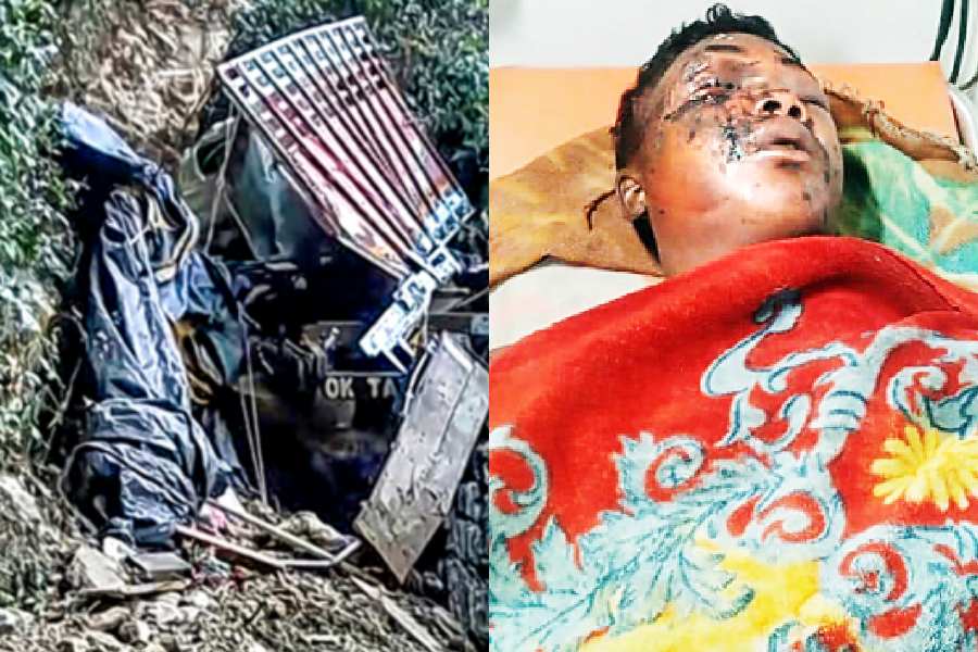 The remnants of the truck which fell into the gorge; Survivor Budheswar Deep