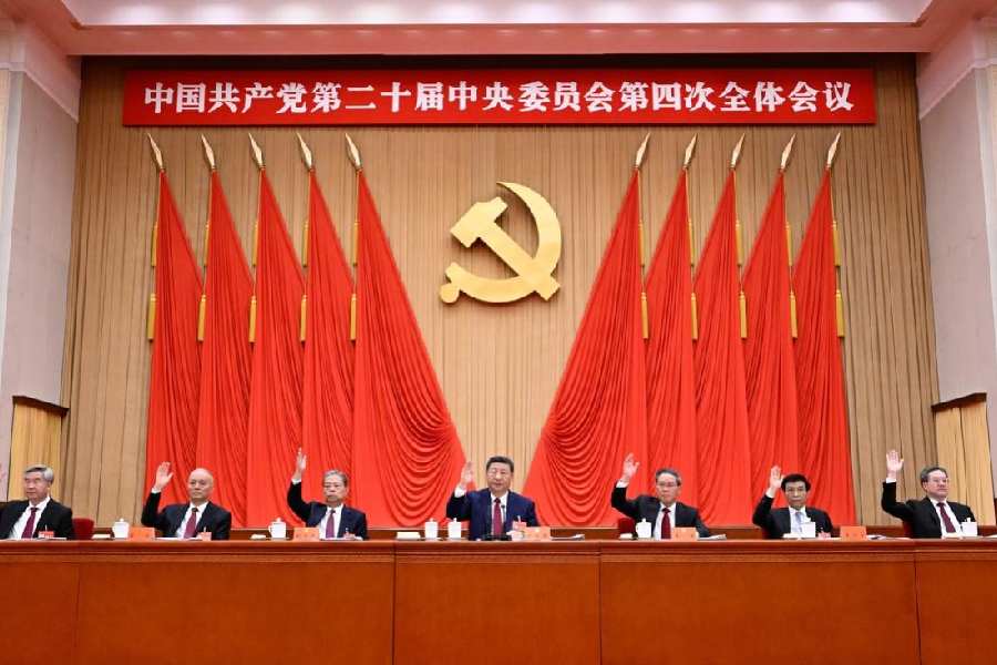 The Chinese president, Xi Jinping, and other leaders attend the Fourth Plenary Session of the 20th Central Committee of the Communist Party of China