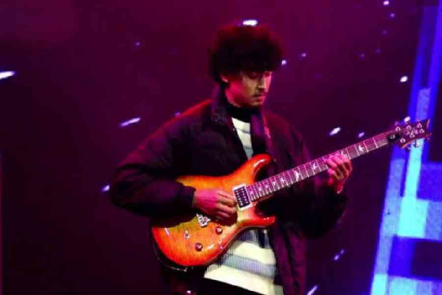 A member of Nepali singer Purna Rai's team performs at the MELOtea FEST in Darjeeling on Thursday evening