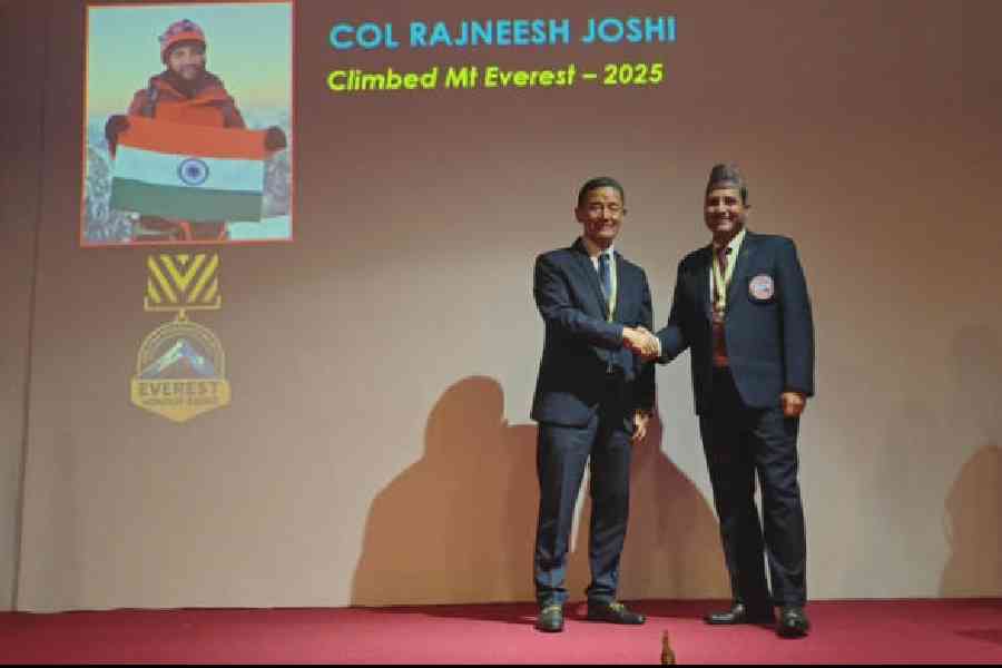HMI principal Col Rajnesh Joshi (right) with Jamling Tenzing Norgay Sherpa at the institution in Darjeeling on Thursday