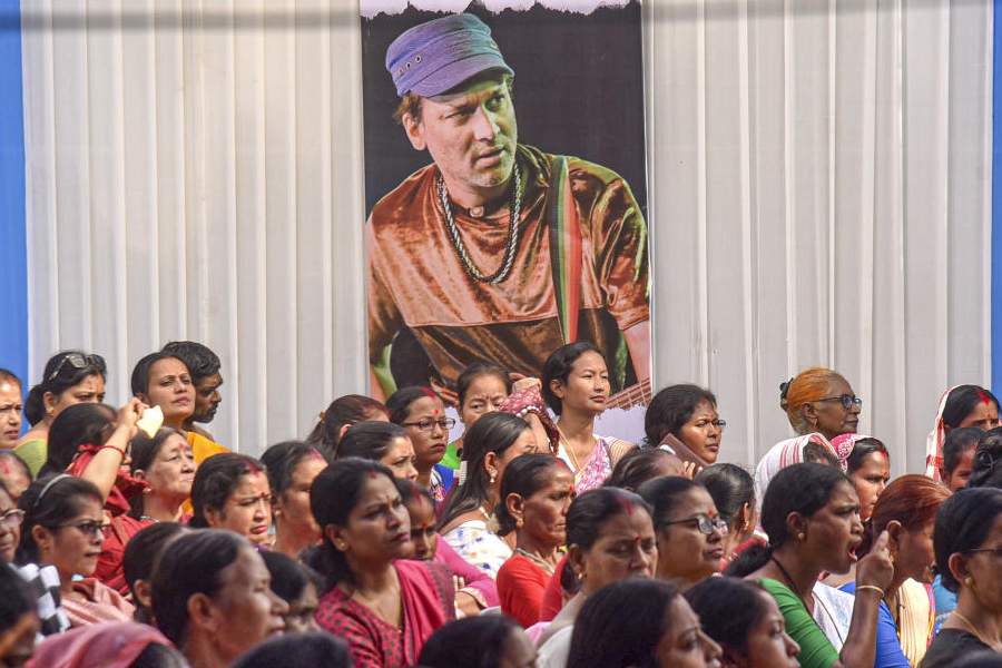 People gather to pay tribute to music icon Zubeen Garg on his birth anniversary, in Guwahati, Tuesday, Nov. 18, 2025.