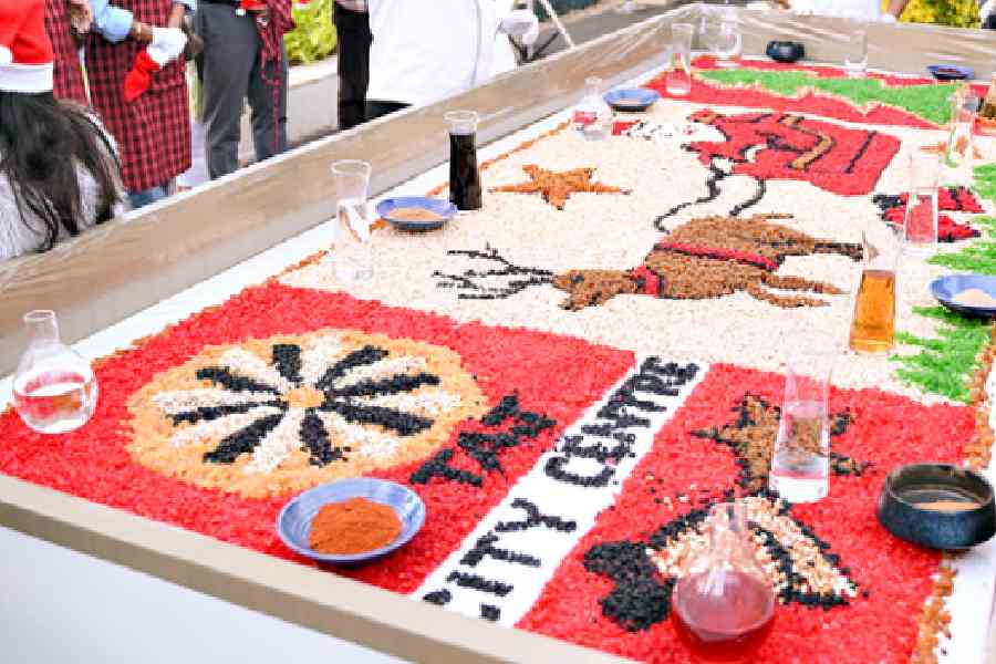 A mosaic of Santa Claus in a sleigh created with the ingredients
