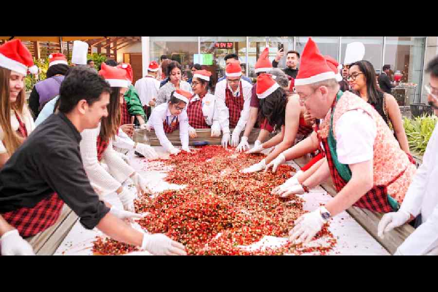 British deputy high commissioner Andrew Fleming, filmmaker Satrajit Sen and other guests at the cake-mixing ceremony at Taj City Centre. This is the fourth year of the event