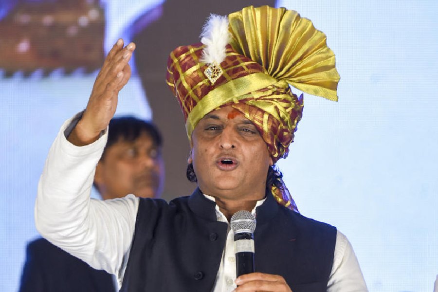 Samajwadi Party President Akhilesh Yadav addresses the gathering during a Yadav community meeting, in Hyderabad, Friday, Dec. 12, 2025.