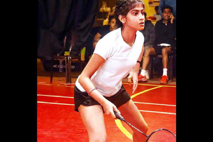 A mixed doubles player in action.