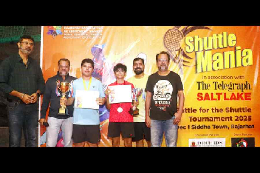 The under-14 medalists on the dais. 