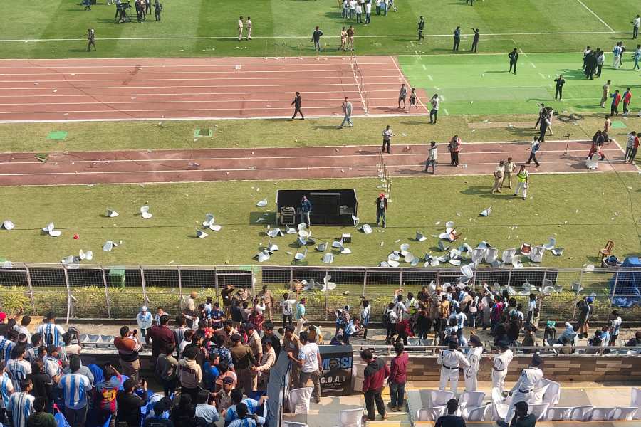 Fans break barricades and enter the ground at Salt Lake Stadium in Kolkata
