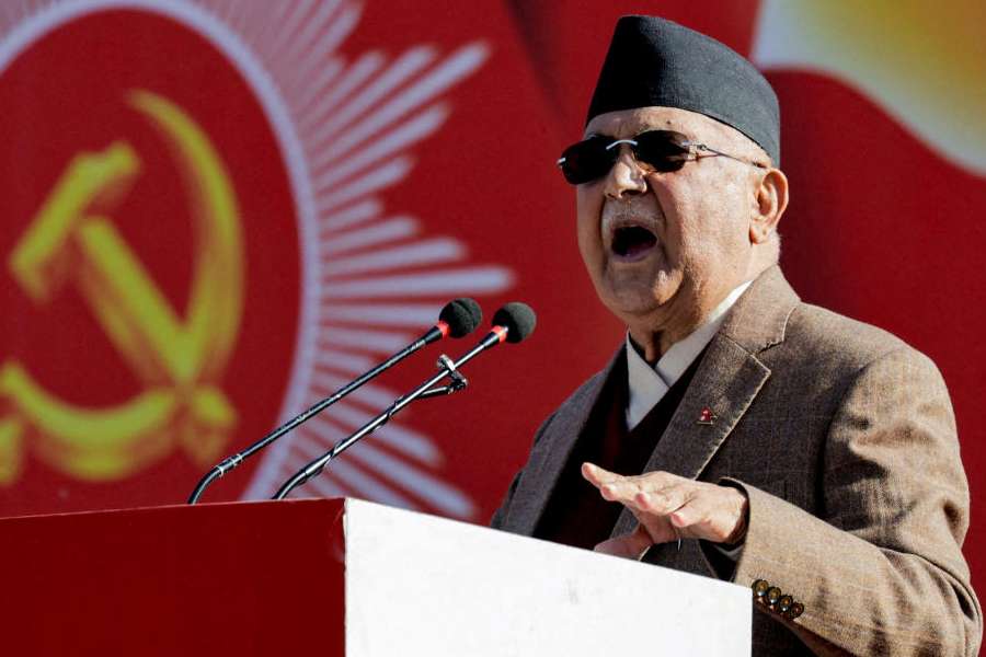 Former Prime Minister of Nepal K.P Sharma Oli, who was forced to resign after the deadly youth-led protests against corruption in early September this year, addresses his party during a rally, where he called for the restatement of parliament dissolved by his successor Sushila Karki, saying it was unconstitutional, in Kathmandu, Nepal, November 22, 2025.