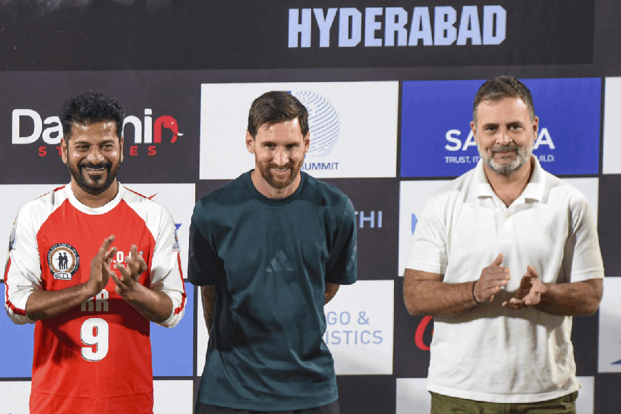 Leader of Opposition in the Lok Sabha Rahul Gandhi, right, and Telangana Chief Minister Revanth Reddy, left, with Argentine footballer and 2022 FIFA World Cup winning captain Lionel Messi during the second leg of 'GOAT India Tour 2025', in Hyderabad, Saturday, Dec. 13, 2025.