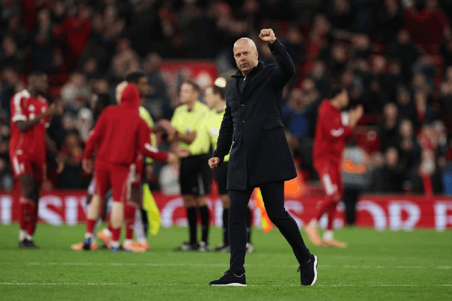 Liverpool manager Arne Slot celebrates after the match against Brighton on December 13, 2025.