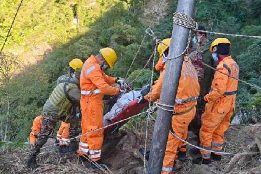 A body being lifted out of the gorge in Anjaw, Arunachal Pradesh, on Saturday