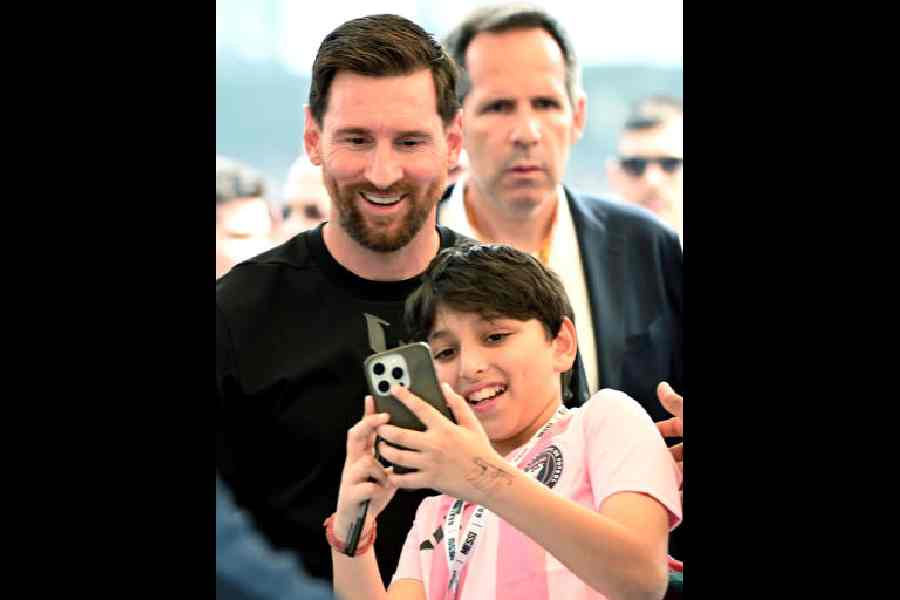 A young fan finds his Messi moment at the Salt Lake Stadium on Saturday.