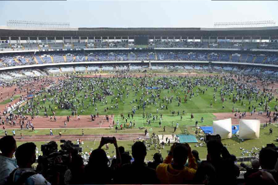 Disgruntled fans invade the Salt Lake Stadium ground on Saturday.
