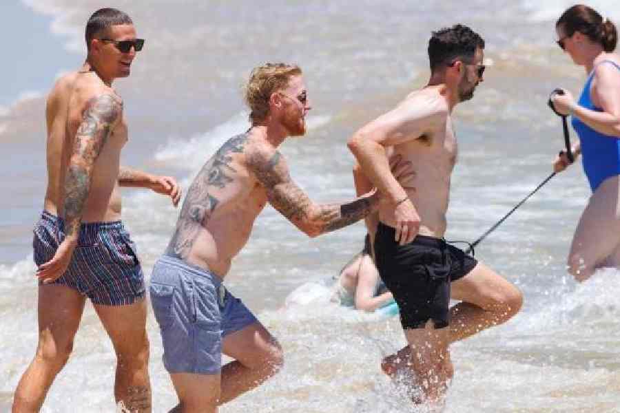 Captain Ben Stokes (centre) with teammates during the England team’s break in Noosa ahead of the third Test in Adelaide, in a picture shared on X 