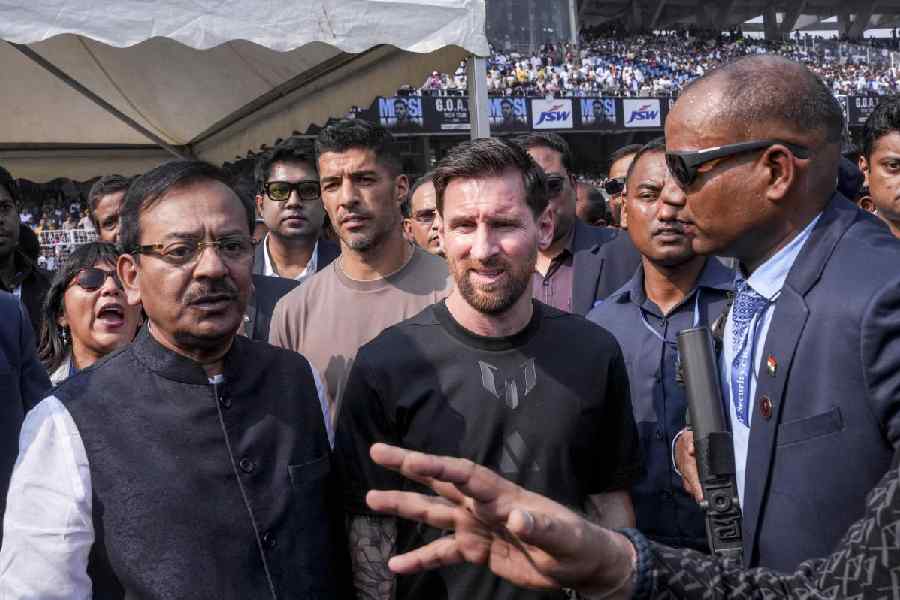 Argentine footballer Lionel Messi, front center, and West Bengal Sports Minister Aroop Biswas, front left, during an event as part of his &#039;G.O.A.T. India Tour 2025&#039;, at Vivekananda Yuba Bharati Krirangan (VYBK), in Kolkata, Saturday, Dec. 13, 2025.