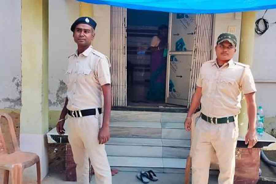 Police personnel deployed at Bholanath Ghosh’s residence in Sarberia, Sandeshkhali, on Sunday. Picture by Pashupati Das