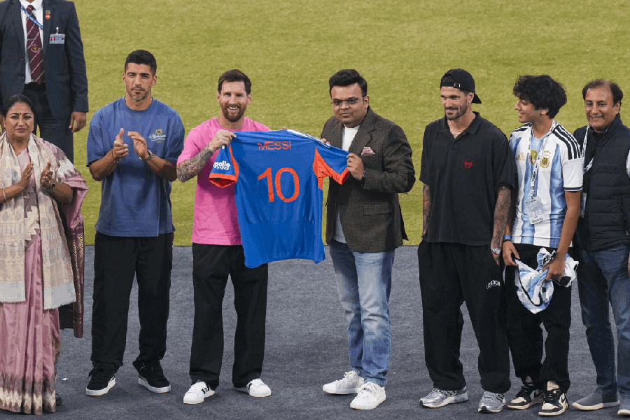 From left, Delhi Chief Minister Rekha Gupta, Uruguayan footballer Luis Suarez, Argentine footballer Lionel Messi, ICC Chairman Jay Shah, Argentine footballer Rodrigo De Paul and others during an event as part of the 'GOAT India Tour 2025', at Arun Jaitley Stadium in New Delhi, Monday, Dec. 15, 2025.
