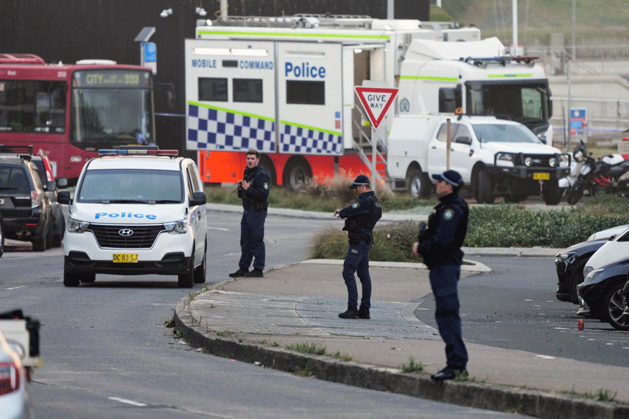 Police patrol in the early morning following a shooting Sunday at Sydney's Bondi Beach, Monday, Dec. 15, 2025.