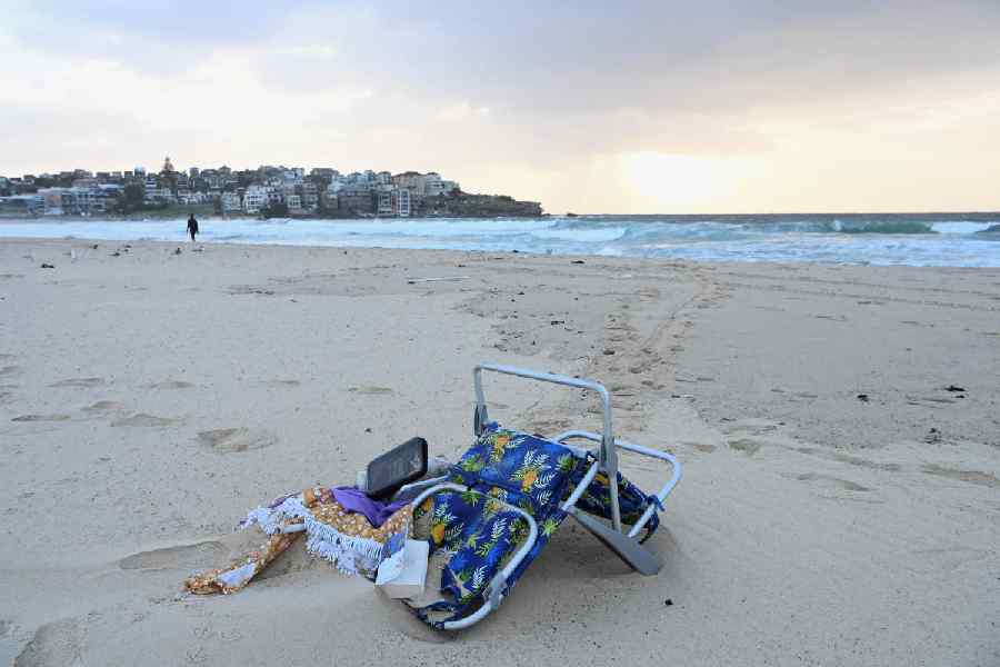 Items lie on the sand following the attack on a Jewish holiday celebration at Sydney's Bondi Beach, in Sydney, Australia, December 15, 2025.