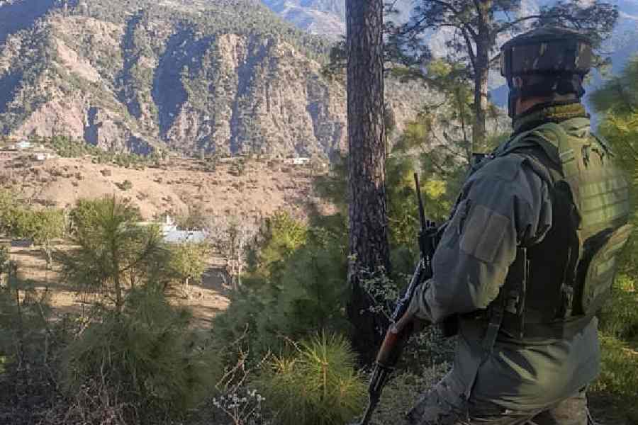 A security official from the Special Operations Group during the anti-militancy operation in Udhampur on Tuesday.