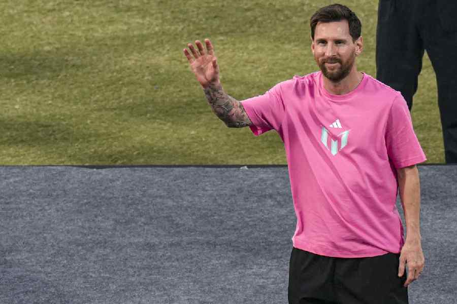 Argentine footballer Lionel Messi greets the gathering during the 'GOAT India Tour 2025', at Arun Jaitley Stadium in New Delhi, Monday, Dec. 15, 2025.