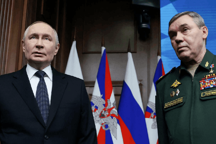 Russia's President Vladimir Putin and Chief of the General Staff of the Russian Armed Forces Valery Gerasimov attend an expanded meeting of the Collegium of the Defence Ministry in Moscow, Russia, December 17, 2025.