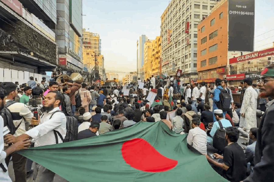 Bangladeshi groups gather for a march following the MEA's summoning of the Bangladesh High Commissioner over a threat to the Indian mission, in Dhaka, Bangladesh, Wednesday, Dec. 17, 2025.