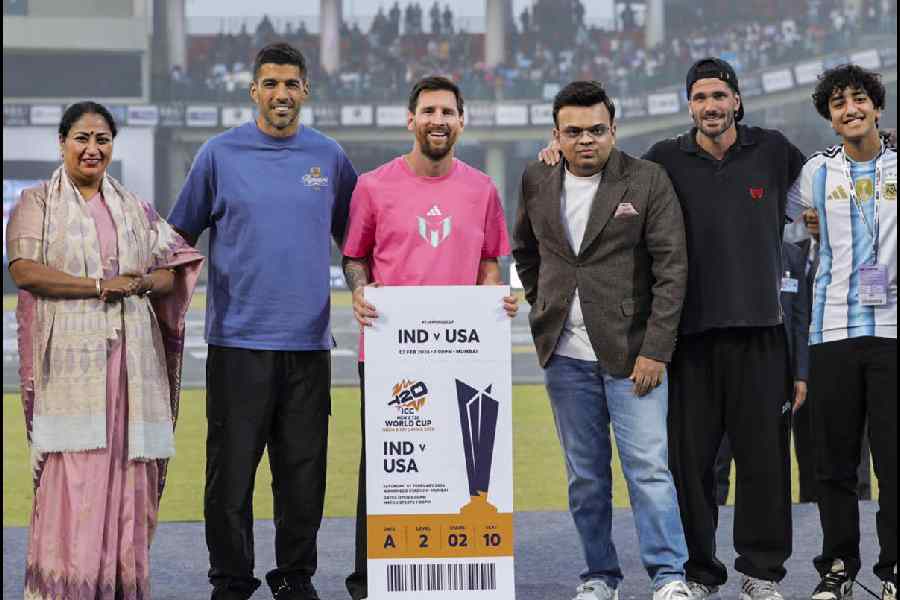 Delhi Chief Minister Rekha Gupta, Uruguayan footballer Luis Suarez, Argentine footballer Lionel Messi, ICC Chairman Jay Shah and Argentine footballer Rodrigo De Paul during an event as part of the 'GOAT India Tour 2025', at Arun Jaitley Stadium in New Delhi.