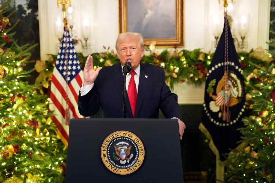 US President Donald Trump delivers an address to the nation from the Diplomatic Reception Room of the White House in Washington, D.C., US, December 17, 2025.