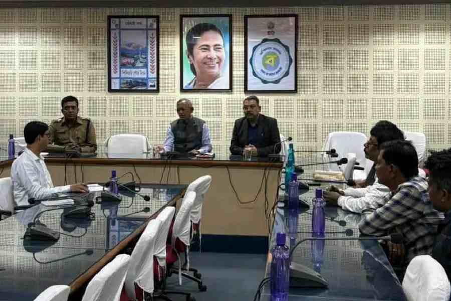 Siliguri mayor Gautam Deb holds a meeting with police officers and representatives of traders on Tuesday on the measures needed to regulate hawkers.