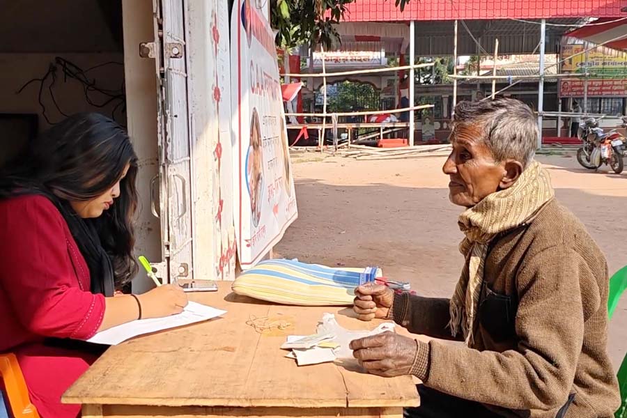 A person applying for citizenship at one of the makeshift camps near Thakurbari.