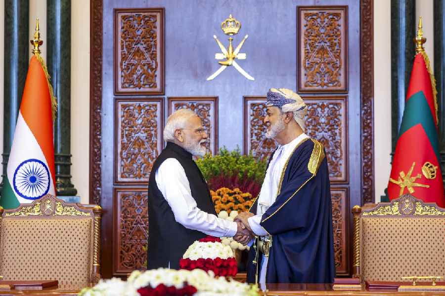 In this image received on Dec. 18, 2025, Prime Minister Narendra Modi with Sultan of Oman Haitham bin Tarik during exchange of MoUs, in Muscat, Oman