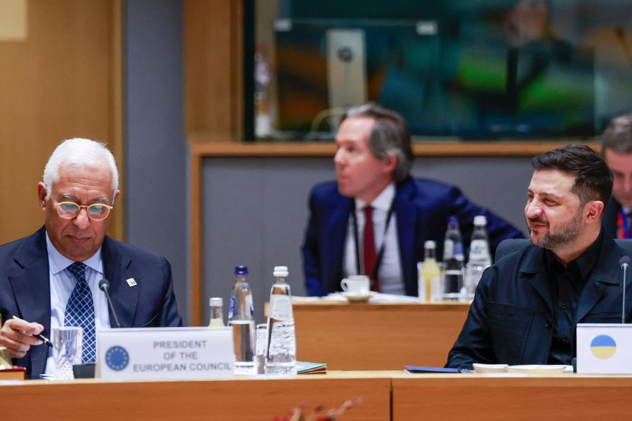 European Council President Antonio Costa, left, and Ukraine's President Volodymyr Zelenskyy attend a round table meeting at the EU Summit in Brussels, Thursday, Dec. 18, 2025.