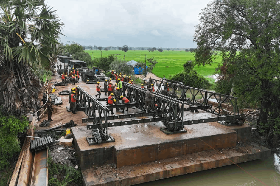 Indian Army engineers work along the A35 near Kilinochchi, supporting bridge restoration to reconnect disrupted road networks and aid communities affected by Cyclone Ditwah in Sri Lanka.