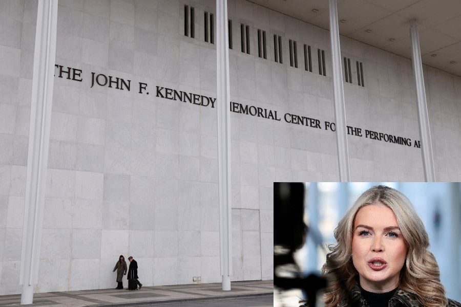 People walk along the front of the John F. Kennedy Center for the Performing Arts, after White House spokeswoman Karoline Leavitt announced that the Kennedy Center board decided to rename the institution the Trump-Kennedy Center in Washington, D.C., U.S., December 18, 2025.