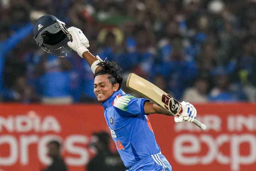 Yashasvi Jaiswal celebrates his century during the third ODI cricket match of a series between India and South Africa, at ACA-VDCA Cricket Stadium, in Visakhapatnam