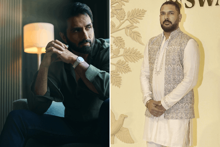 Actor Sonu Sood (left), Former India cricketer Yuvraj Singh (right)