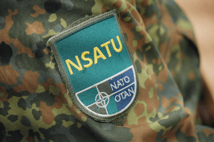 The logo of Nato's Ukraine mission Nato Security Assistance and Training for Ukraine (NSATU) on an uniform sleeve during a training session at the NSATU headquarters of the Lucius D. Clay barracks in Wiesbaden, Germany, December 18, 2025.