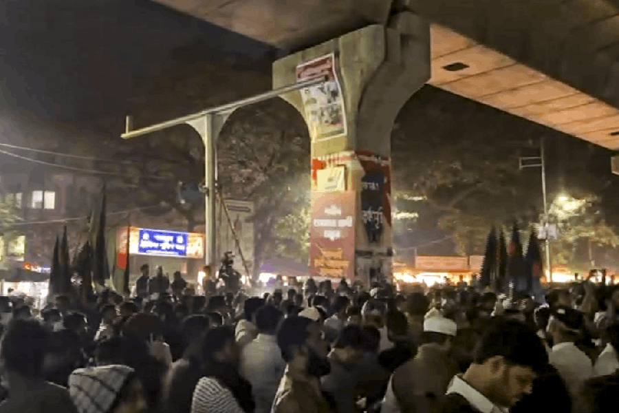 People stage a protest over the death of Sharif Osman Hadi, one of the key leaders in the Bangladesh student uprising, in Dhaka, Bangladesh, Friday, Dec. 19, 2025.