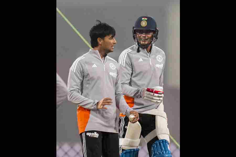 Abhishek Sharma and (right) Shubman Gill are likely to partner at the top for the T20 World Cup.