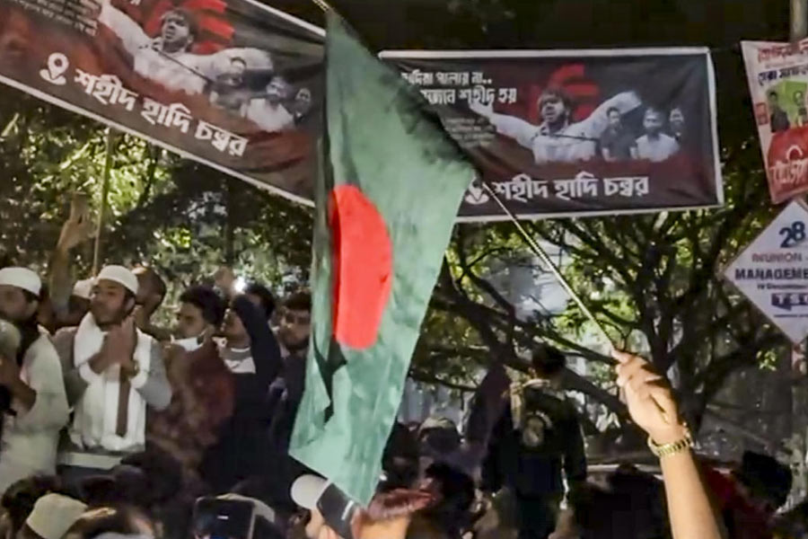 People stage a protest over the death of Sharif Osman Hadi, one of the key leaders in the Bangladesh student uprising, in Dhaka, Bangladesh, Friday, Dec. 19, 2025.