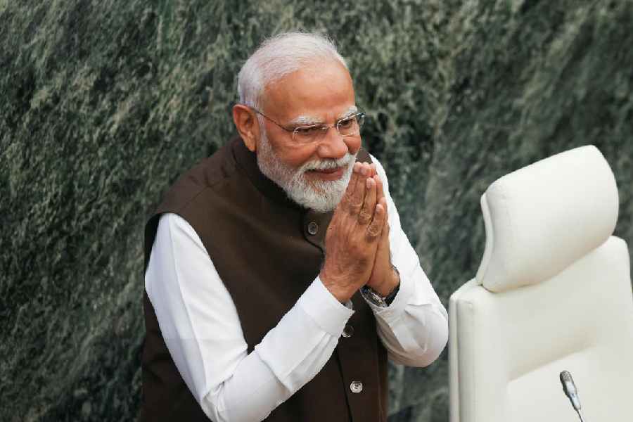India's Prime Minister Narendra Modi greets Ethiopia's parliament members after addressing them at the Parliament Building during his visit to Addis Ababa, Ethiopia December 17, 2025.